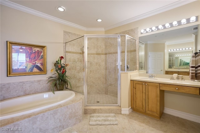 bathroom with crown molding, vanity, plus walk in shower, and tile patterned flooring