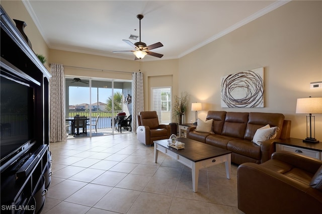 tiled living room featuring ornamental molding and ceiling fan