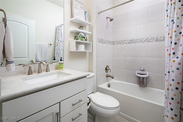 full bathroom with vanity, shower / bath combination with curtain, and toilet