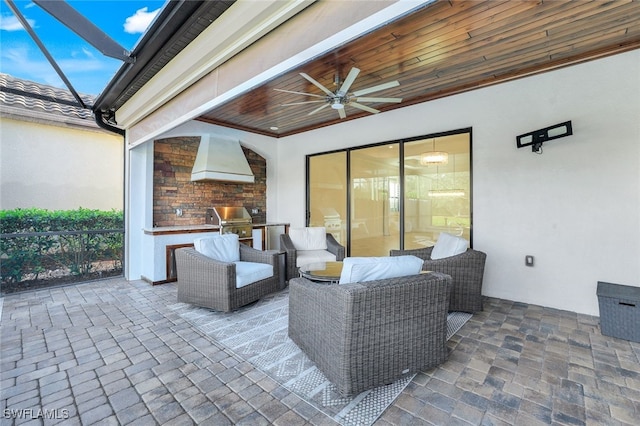 view of patio / terrace with area for grilling and ceiling fan