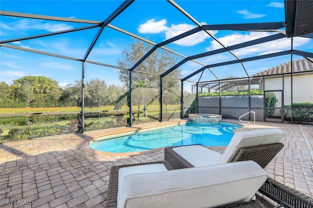 view of pool featuring an in ground hot tub, a patio, and glass enclosure