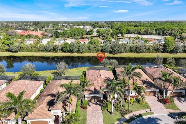 bird's eye view with a water view