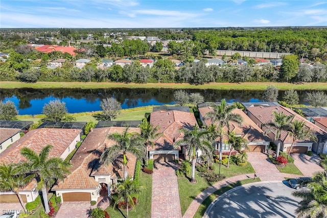 drone / aerial view with a water view