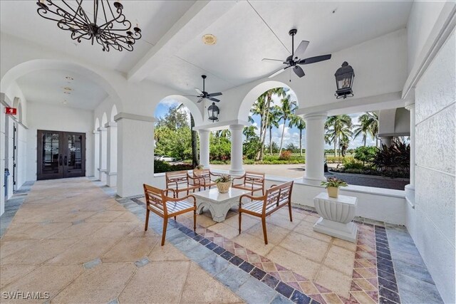 view of patio / terrace featuring french doors and ceiling fan