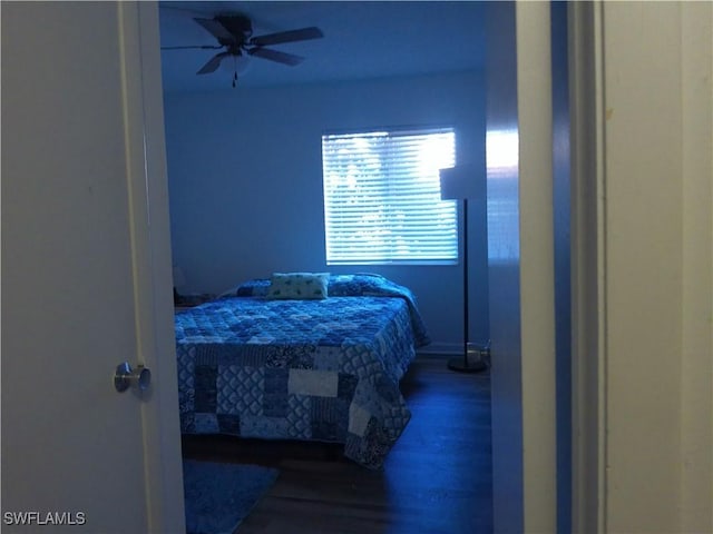 bedroom featuring wood-type flooring