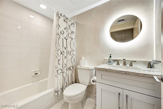 full bathroom with tile patterned flooring, vanity, shower / tub combo, and toilet