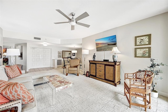 living room featuring ceiling fan