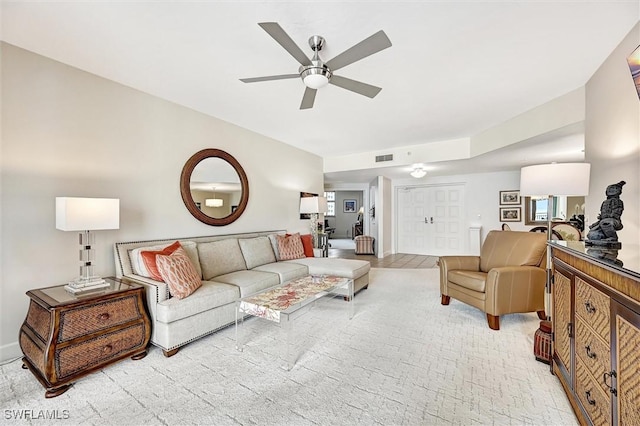 living room with ceiling fan