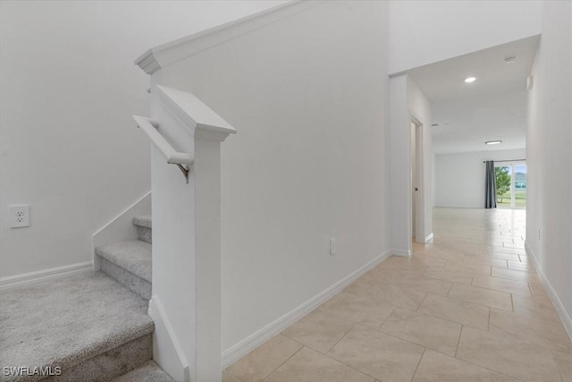 staircase with tile patterned flooring