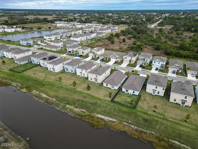 drone / aerial view with a water view