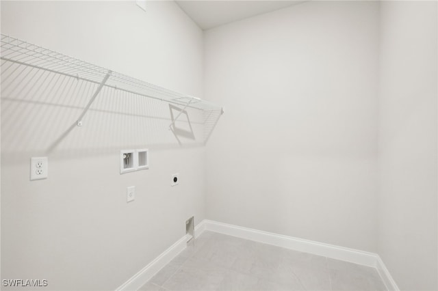 clothes washing area featuring washer hookup and electric dryer hookup