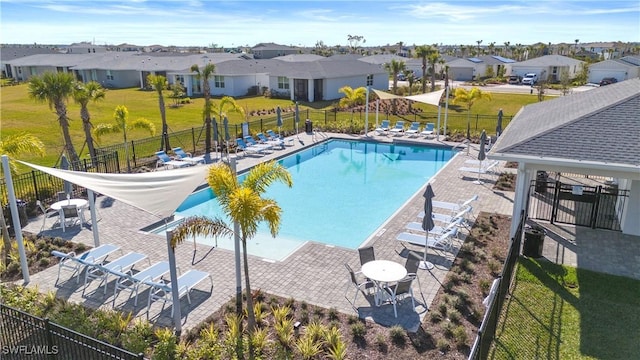 view of swimming pool featuring a patio