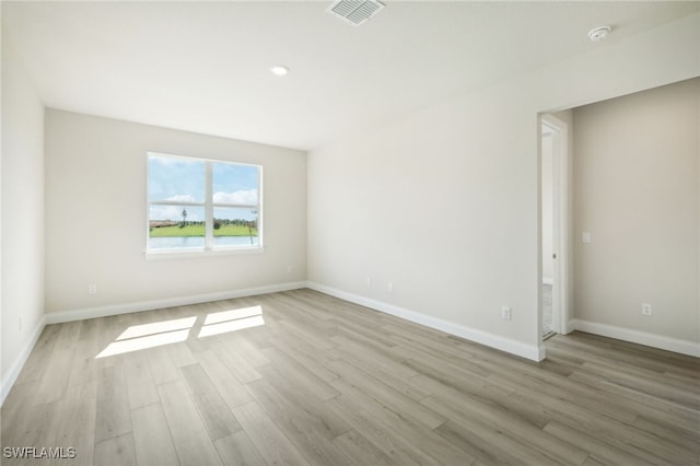 empty room featuring light hardwood / wood-style floors