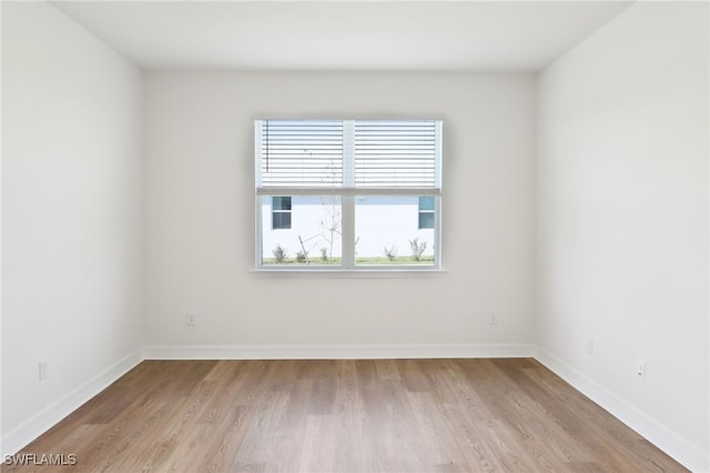 16672 Expedition Ct, Punta Gorda, FL 33982 - empty room featuring wood finished floors and baseboards