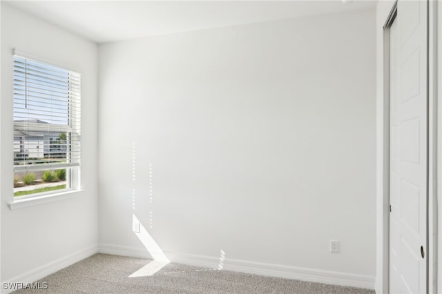 16672 Expedition Ct, Punta Gorda, FL 33982 - spare room with light carpet, baseboards, and plenty of natural light