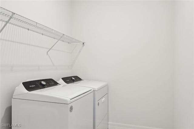16672 Expedition Ct, Punta Gorda, FL 33982 - laundry area with washing machine and clothes dryer
