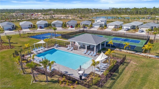 16672 Expedition Ct, Punta Gorda, FL 33982 - community pool with a water view and a residential view