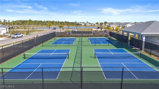 16672 Expedition Ct, Punta Gorda, FL 33982 - view of tennis court with community basketball court and a water view