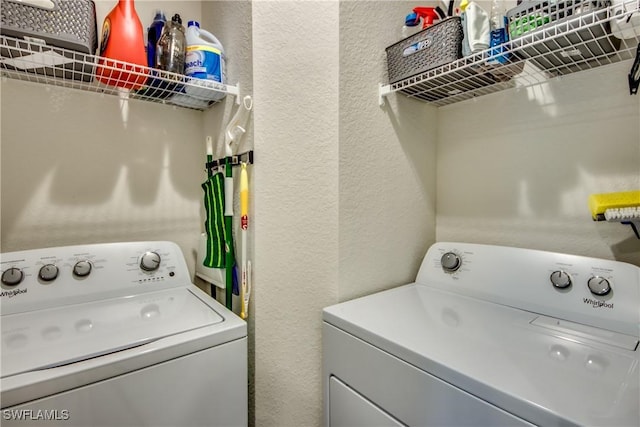 laundry room with washing machine and dryer