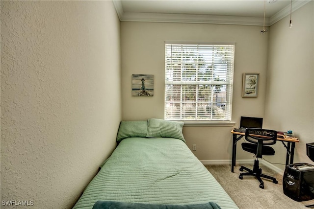 carpeted bedroom featuring crown molding