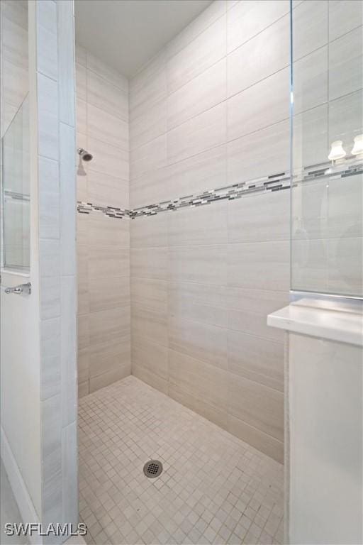 full bathroom with tiled shower