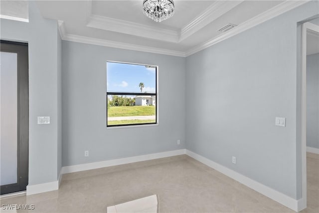 tiled empty room featuring a raised ceiling, crown molding, and a chandelier