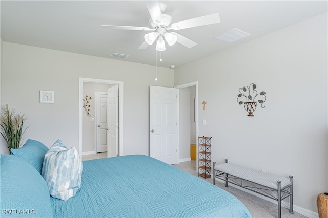 bedroom with light carpet and ceiling fan