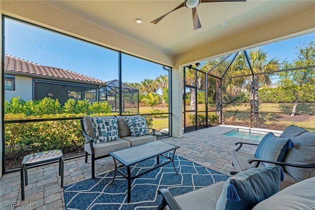 sunroom / solarium with ceiling fan