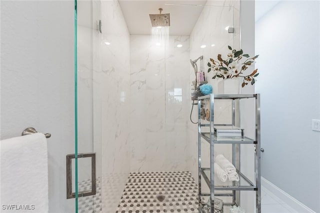 bathroom with an enclosed shower and tile patterned flooring