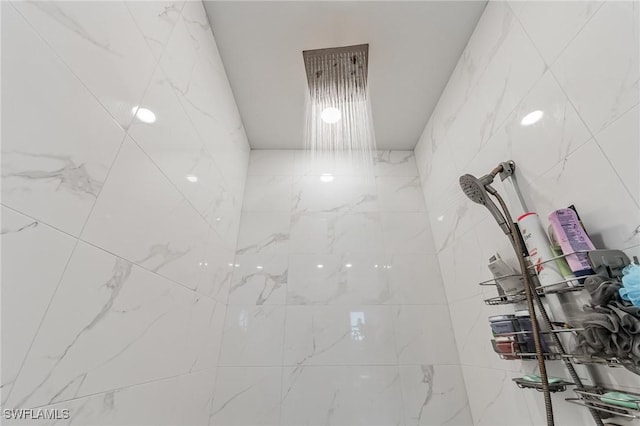 interior space with a tile shower