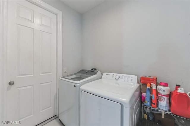 laundry room featuring independent washer and dryer