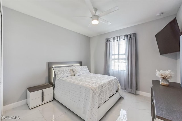 bedroom featuring ceiling fan