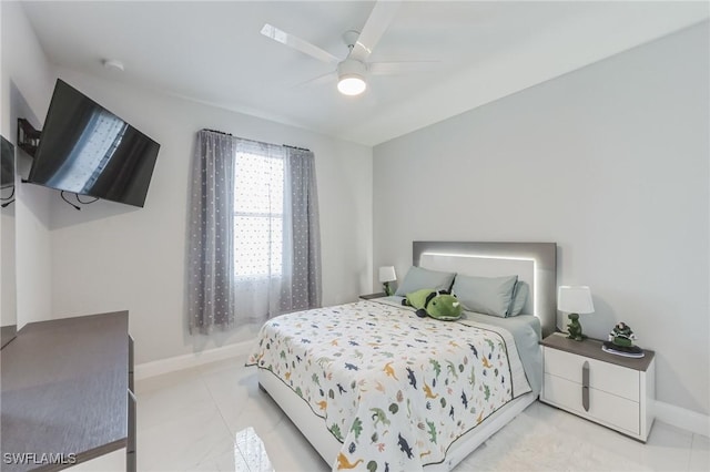 bedroom with light tile patterned floors and ceiling fan