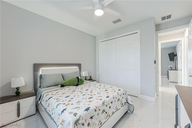 bedroom with a closet and ceiling fan