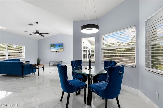 dining room with lofted ceiling and ceiling fan