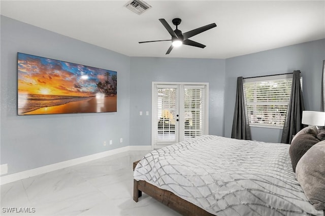 bedroom featuring multiple windows, access to exterior, french doors, and ceiling fan