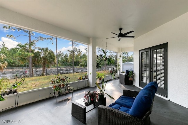 sunroom / solarium with ceiling fan