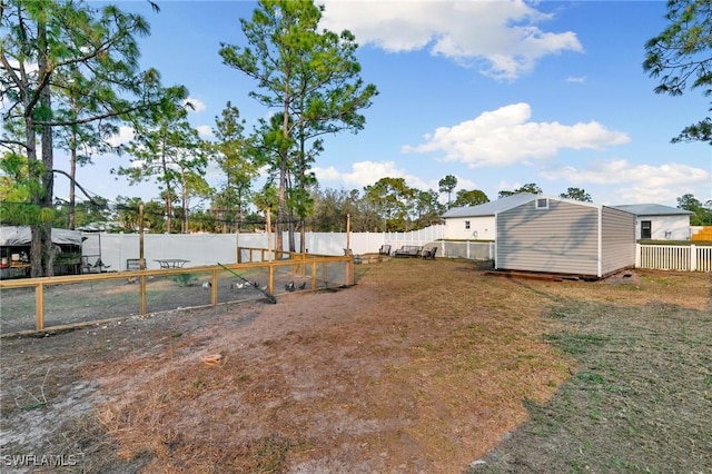 view of yard with a storage shed