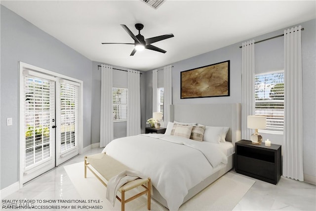 bedroom featuring access to outside, ceiling fan, and french doors