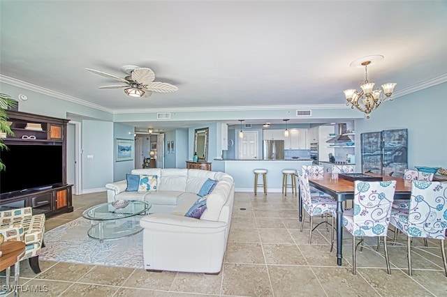 living room featuring crown molding and ceiling fan with notable chandelier