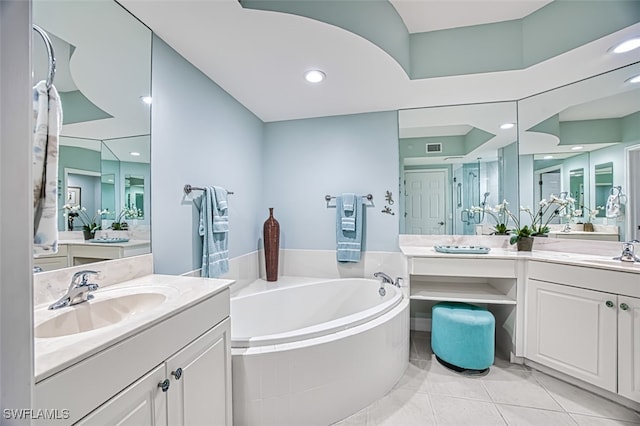 bathroom featuring vanity, shower with separate bathtub, and tile patterned floors