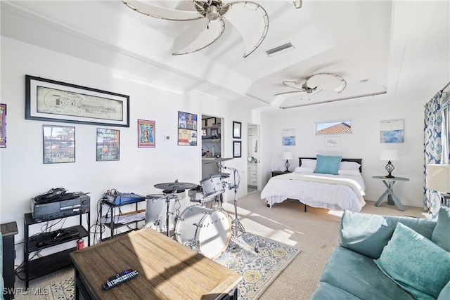 bedroom with ceiling fan and carpet