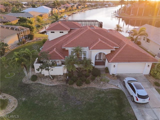 drone / aerial view with a water view