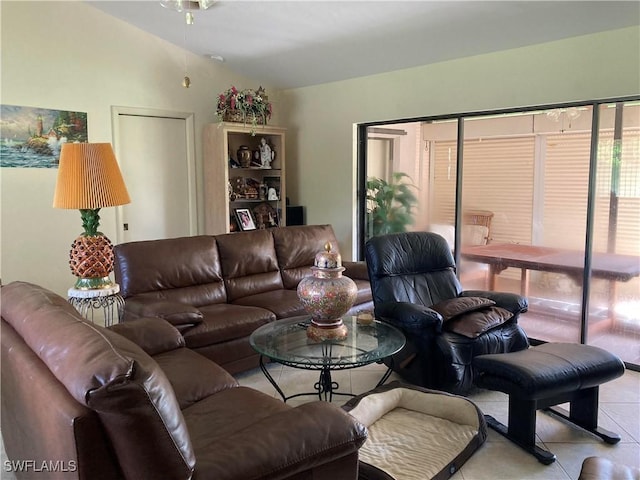 tiled living room with lofted ceiling