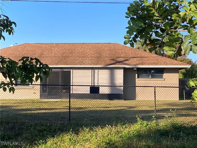 view of home's exterior with a lawn