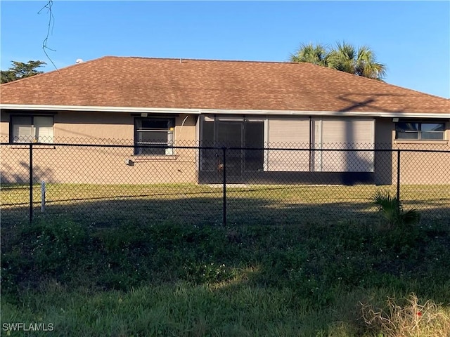 view of home's exterior with a yard