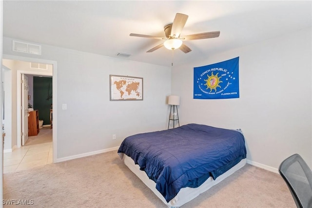 bedroom with light carpet and ceiling fan