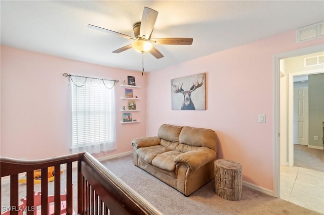 carpeted bedroom featuring ceiling fan