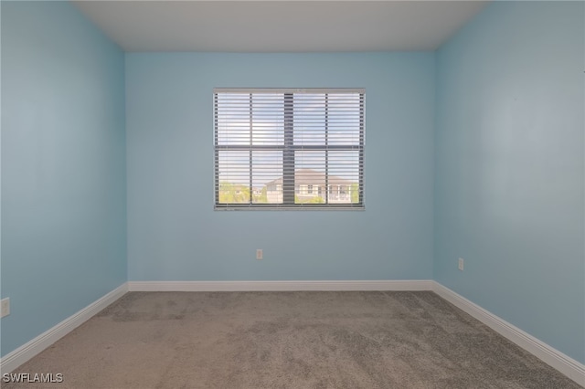 view of carpeted spare room