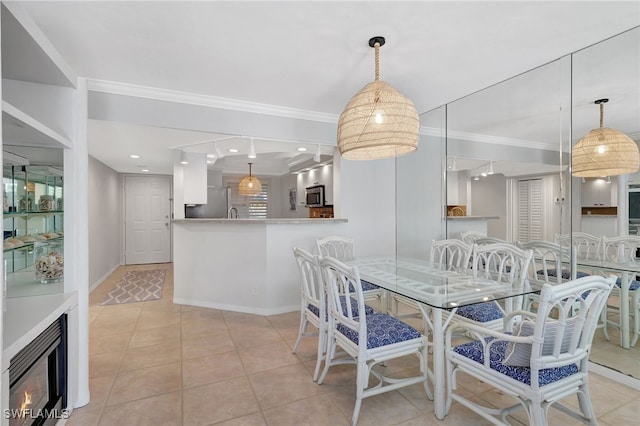 tiled dining space with crown molding